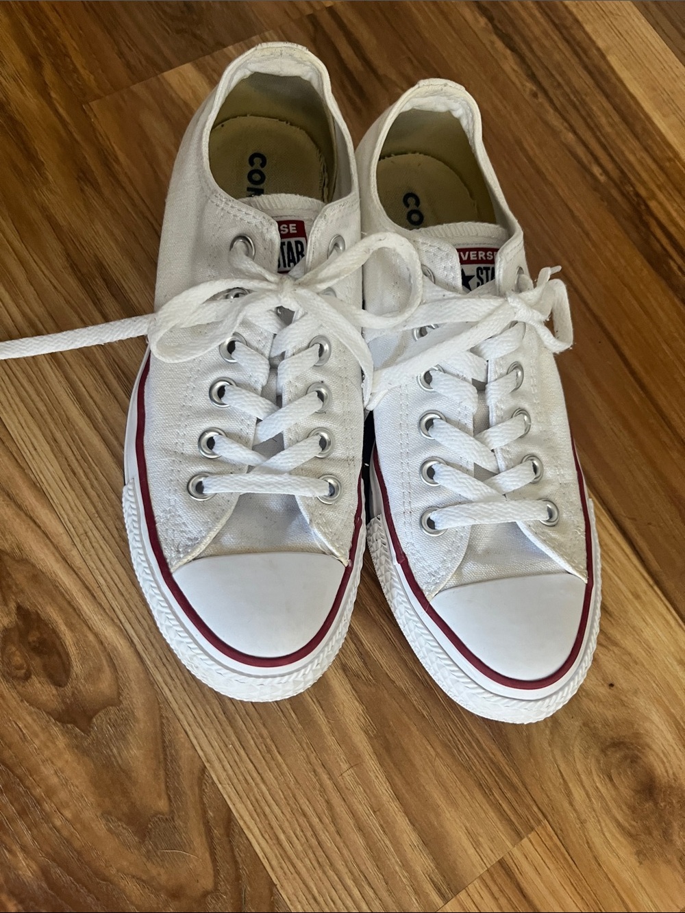 Converse Low Top Sneakers in White with Red Trim